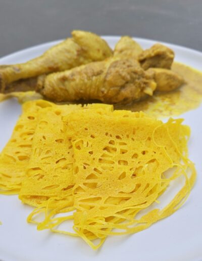 Roti Jala, Nyonya's laced pancake with curry chicken